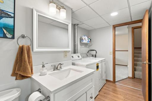 Lower level 3/4 bathroom and laundry room