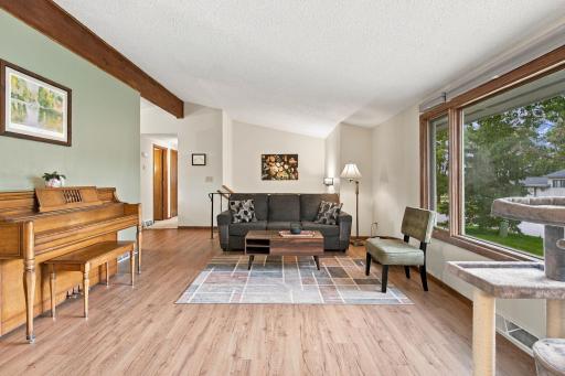 Main level living room with large picture window to let in all the natural light!