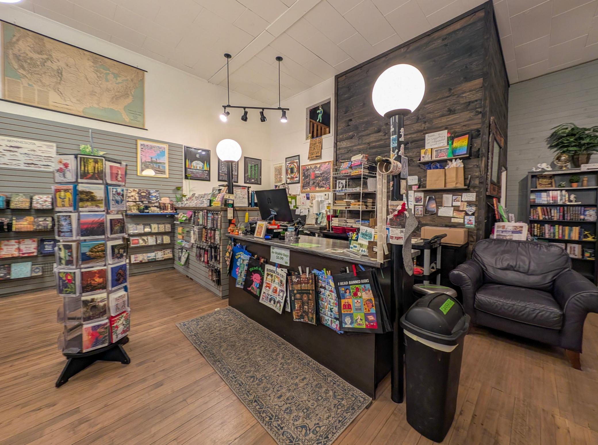 Inside, hardwood floors run throughout the front retail space in this commercial building in Perham, MN 56573