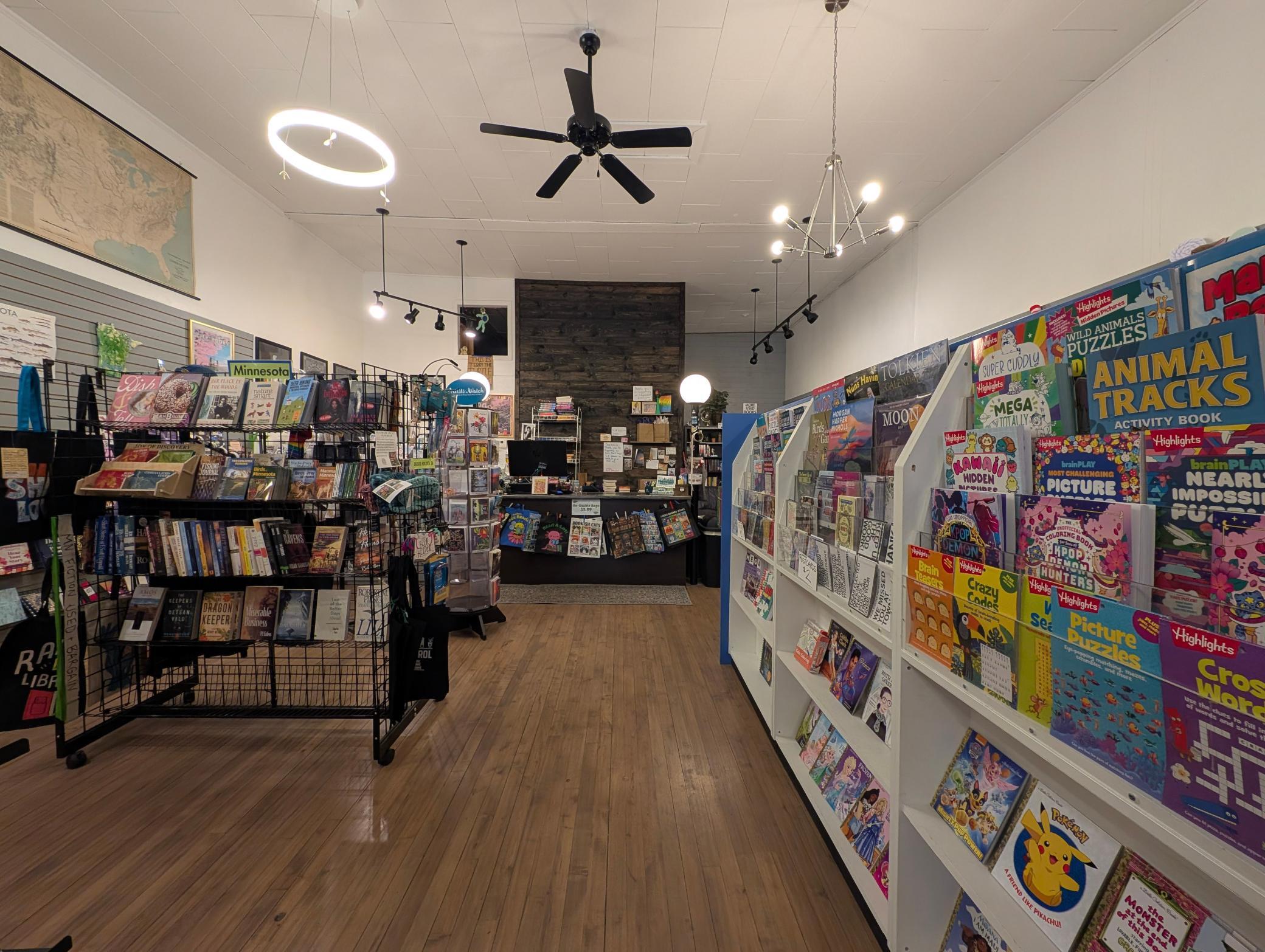 Inside, hardwood floors run throughout the front retail space in this commercial building in Perham, MN 56573