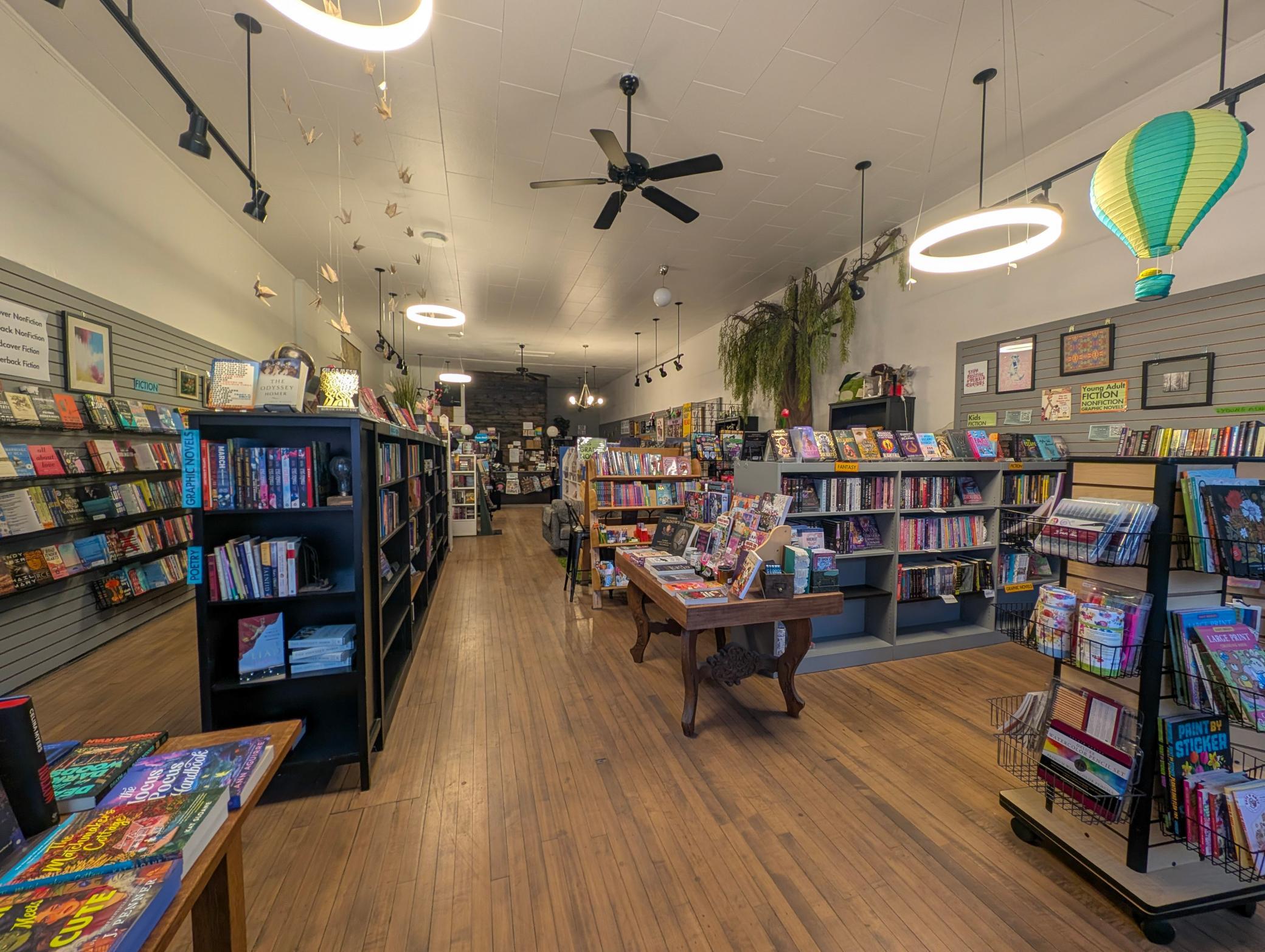 Inside, hardwood floors run throughout the front retail space in this commercial building in Perham, MN 56573