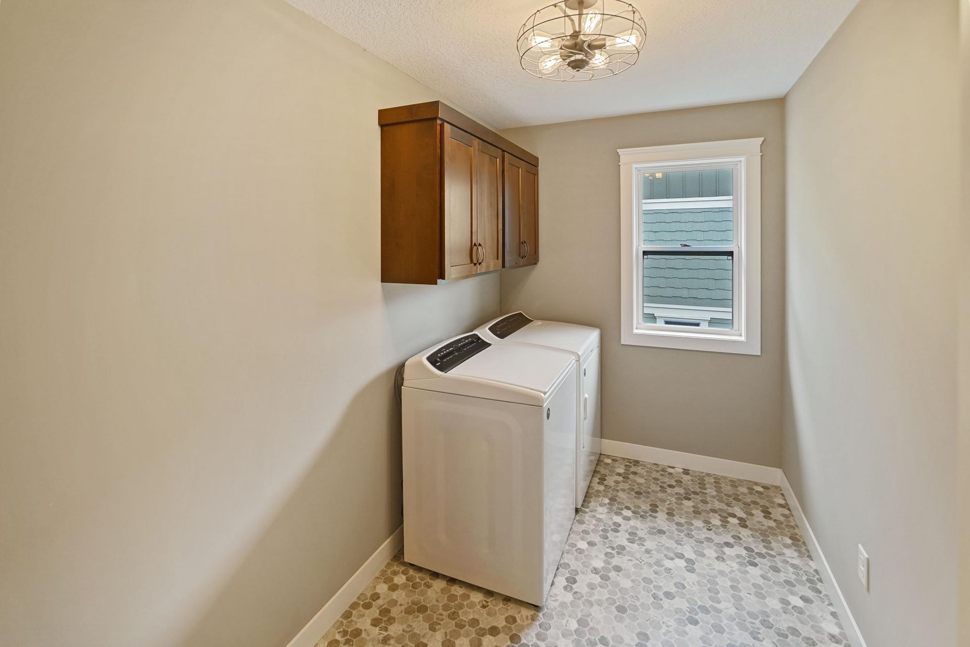 Second level bedroom laundry.
