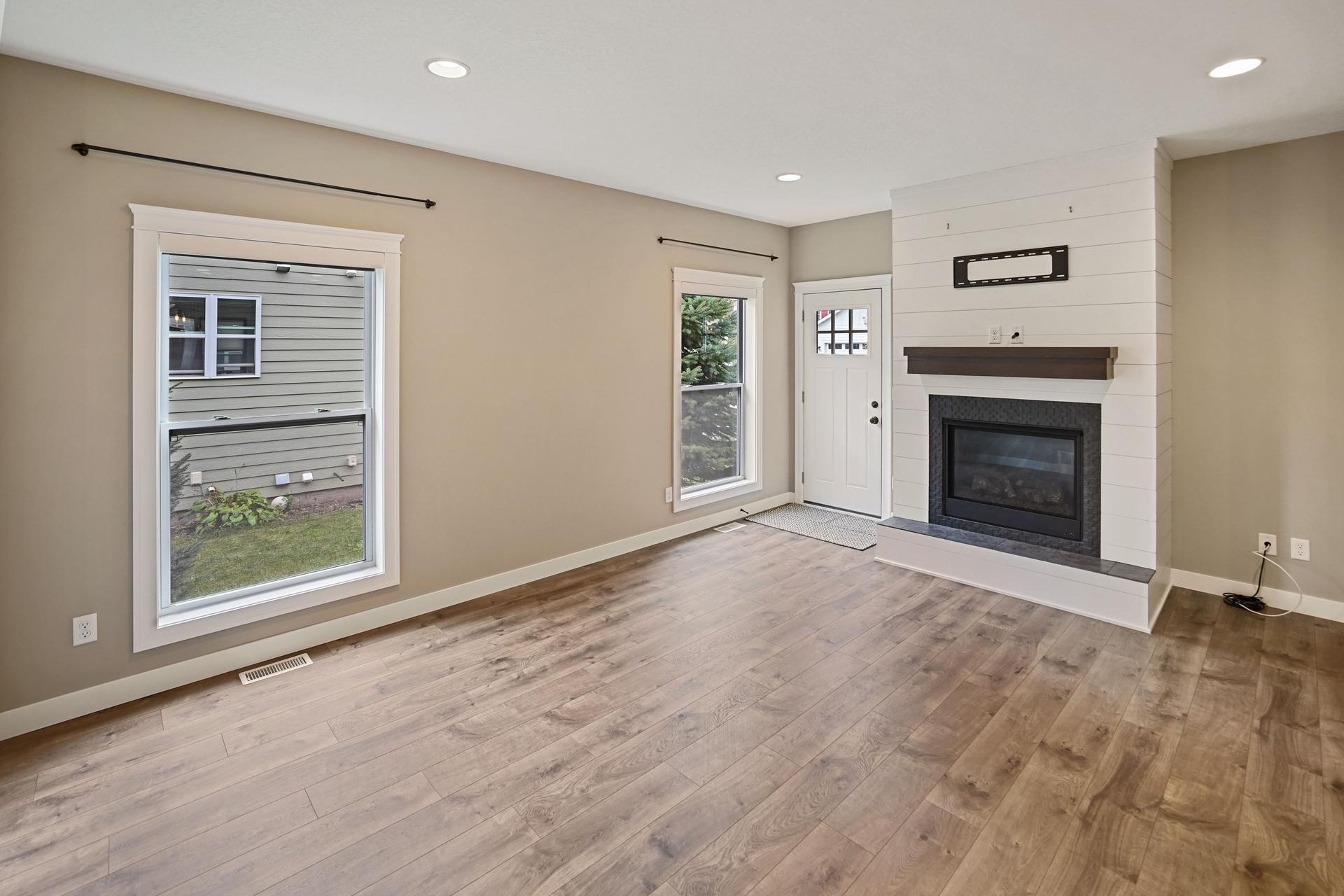 Living room with gas fireplace.