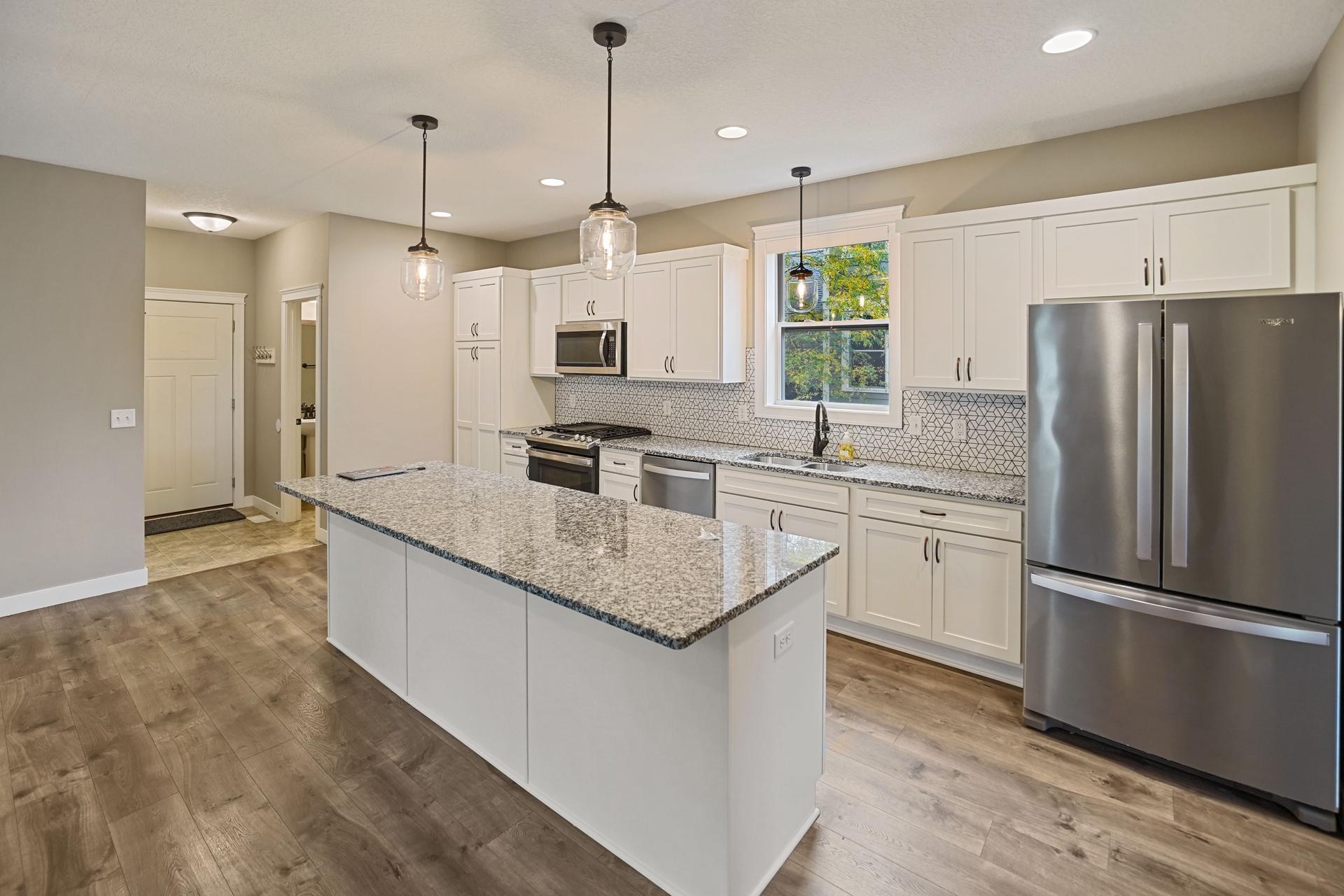 Lots of counter space and cabinets for storage.