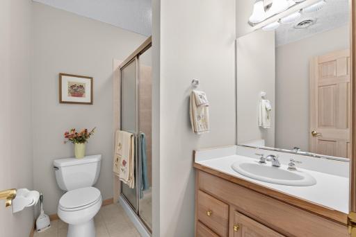 Convenient lower-level bath for guests or family.