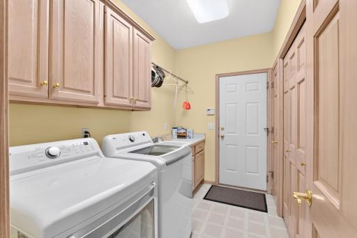 Main-level laundry keeps daily routines easy.