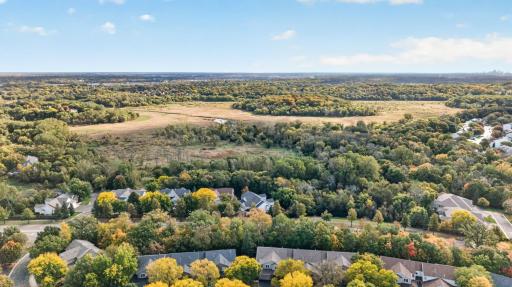 Property backs to Medicine Lake Regional Trail and Elm Creek open area.
