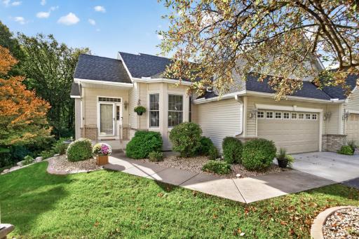 Private end-unit setting with welcoming curb appeal.