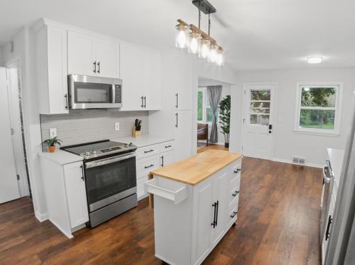 Beautiful newer floors throughout Kitchen and Dining Room