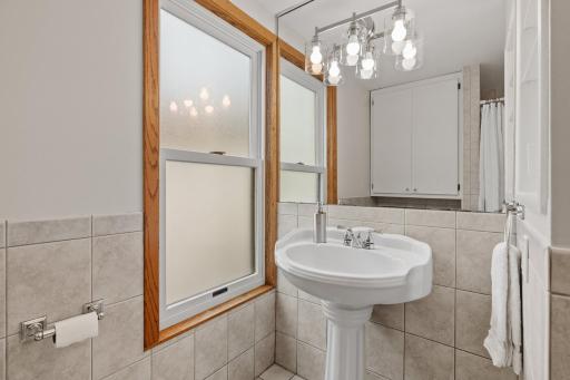 Full bath freshly painted with new fixtures and hardware