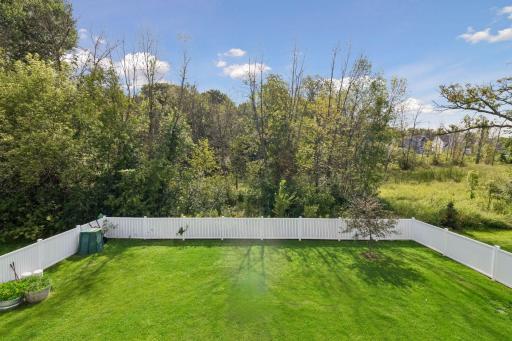 Privacy new construction can't rival. Fenced rear yard with wooded area beyond