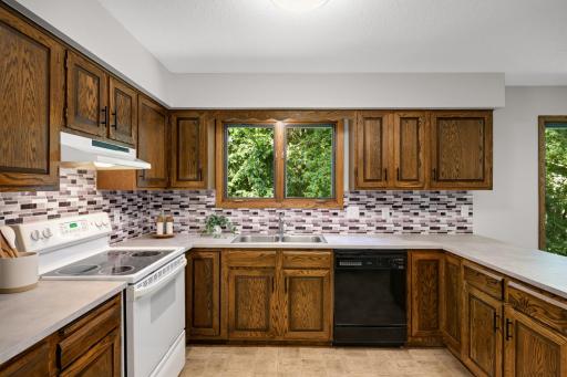 Kitchen offers refreshed cabinets and brand new counter tops.