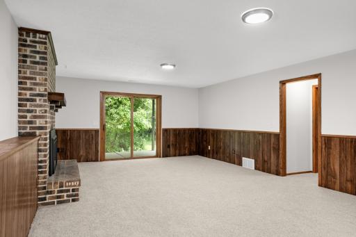 Sliding glass doors open up to back patio