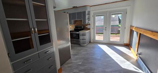 Dining to deck and kitchen
