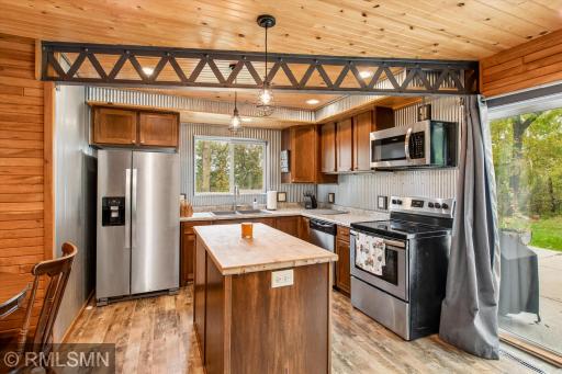 Kitchen with island and stainless steel appliances!