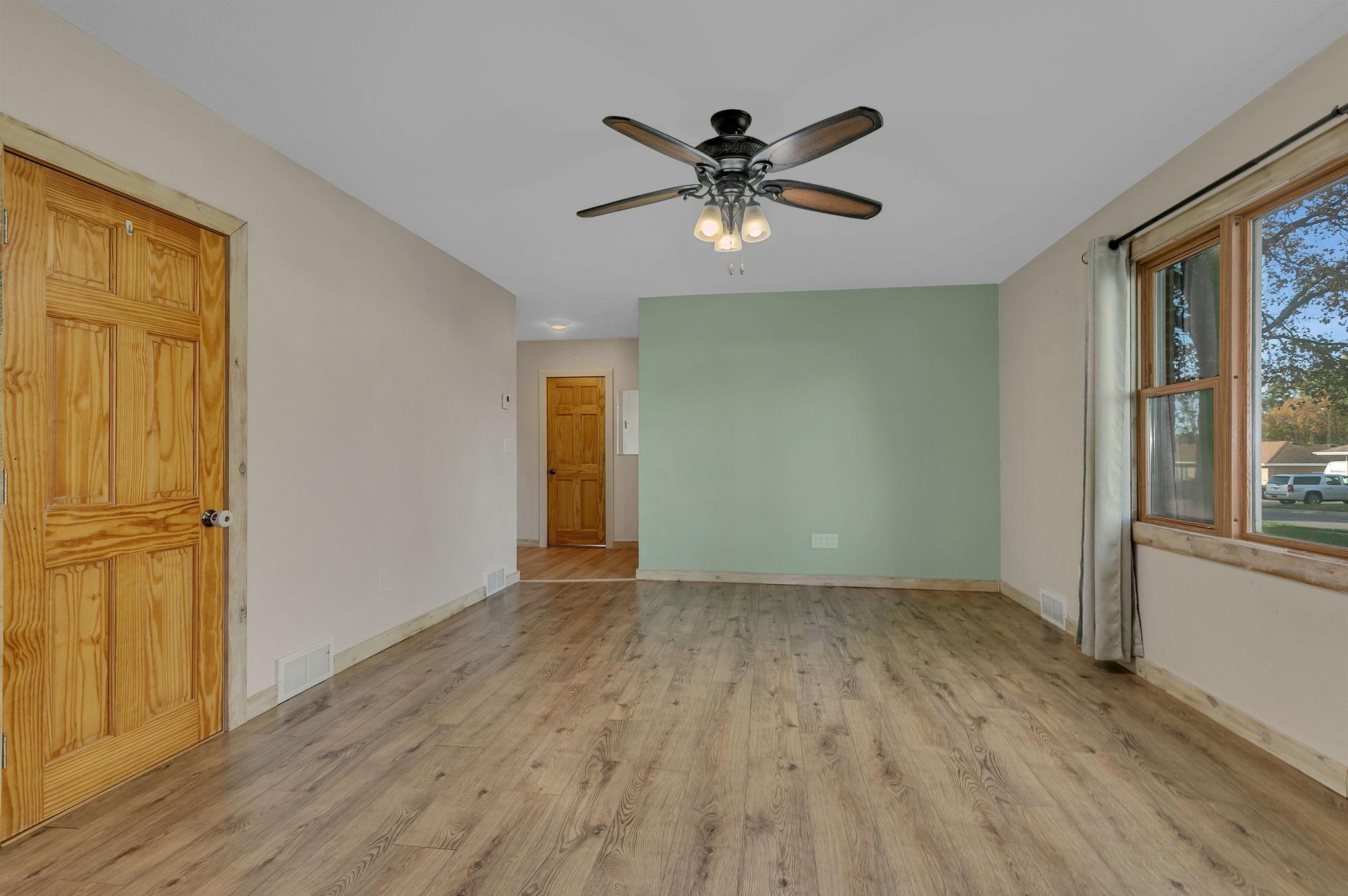 Hall leads to 3 bedrooms, bathroom and laundry room