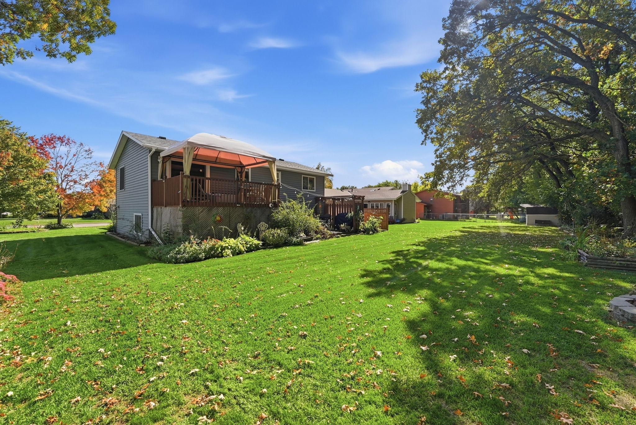 Mature trees help shade the back yard.