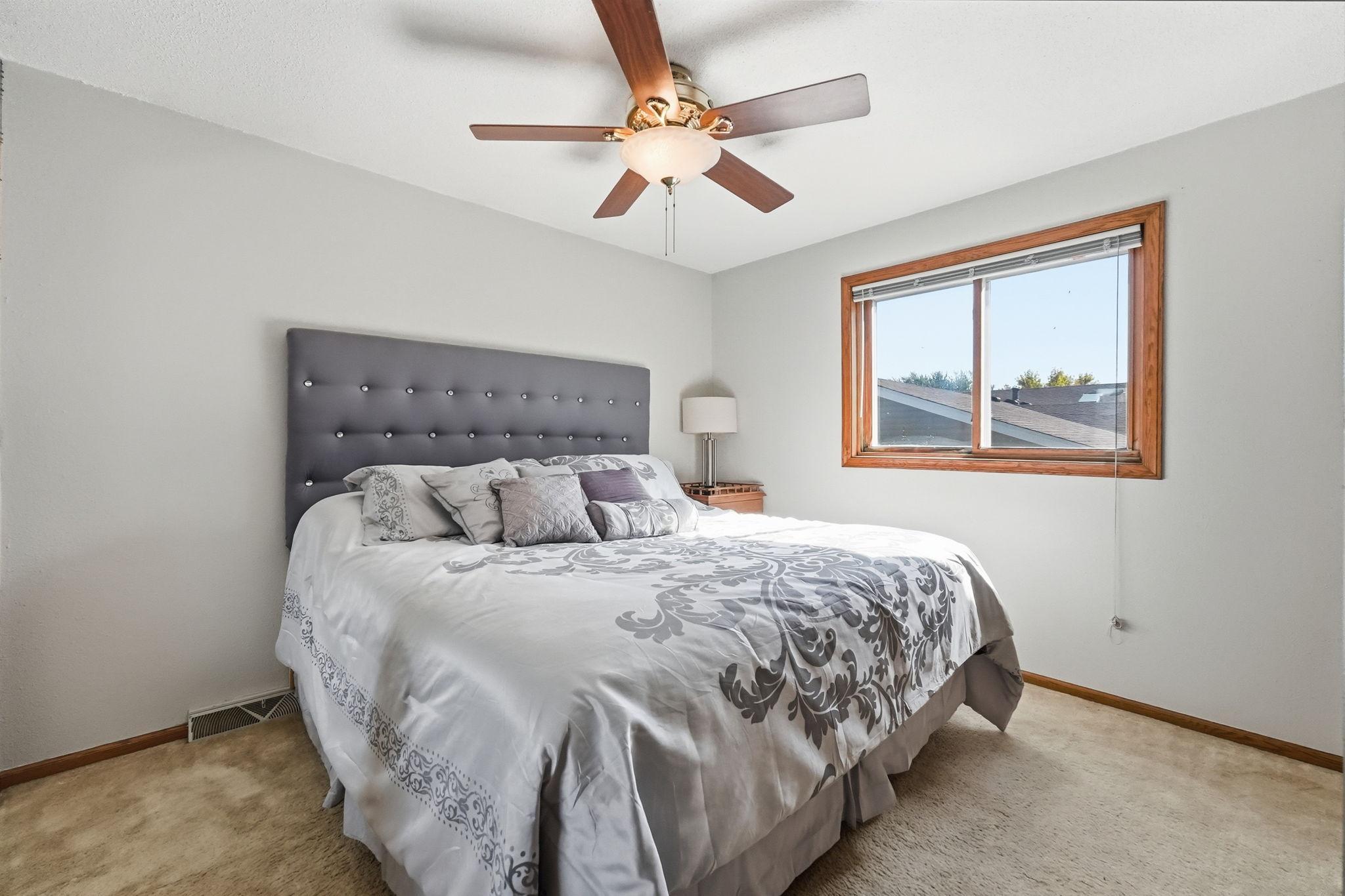 Spacious primary upper level bedroom.