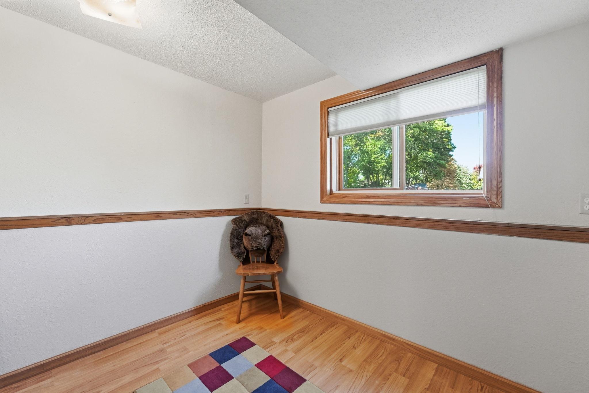 Lower level flex room awaits your personal touch.