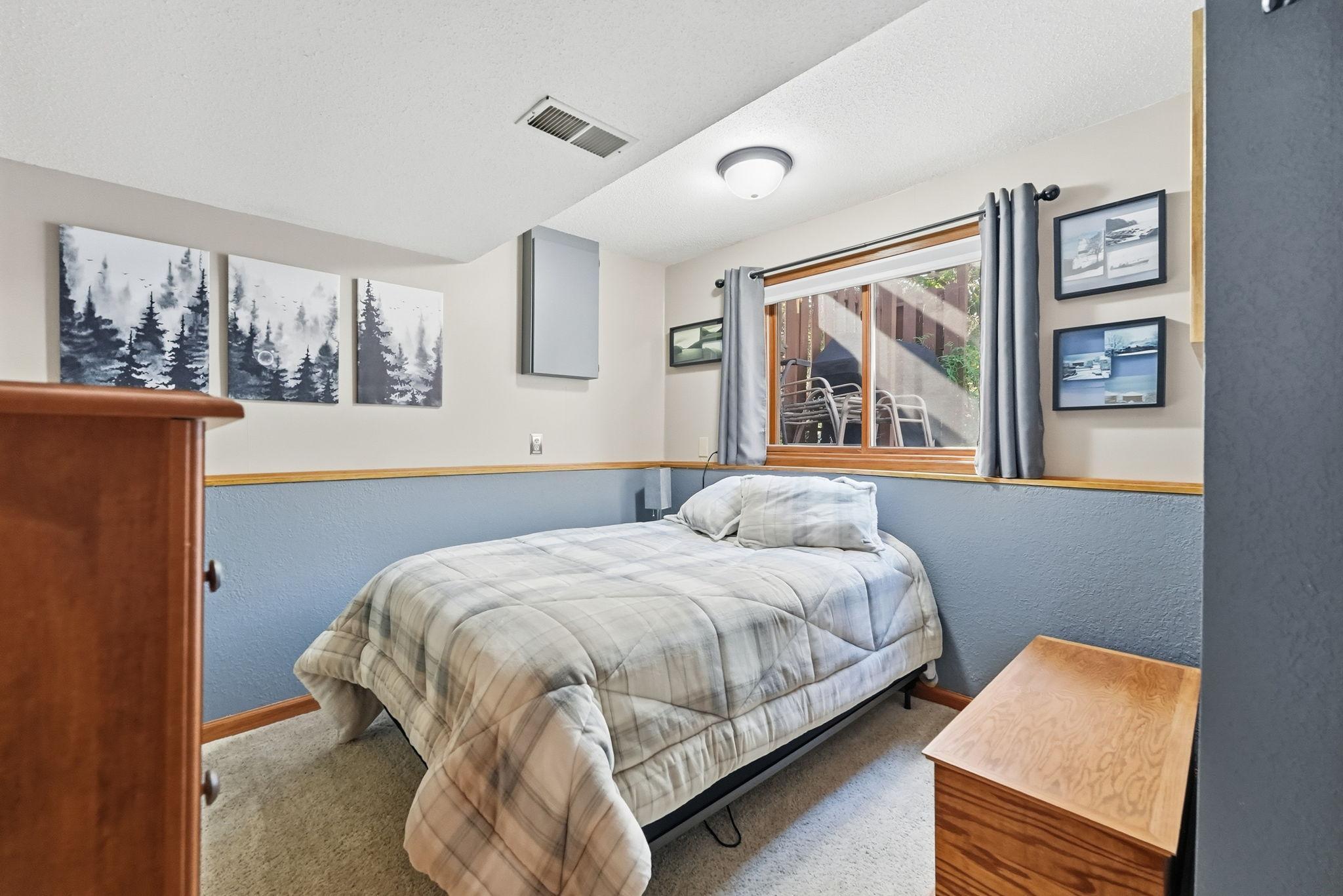 Lower level bedroom, ready for customization.