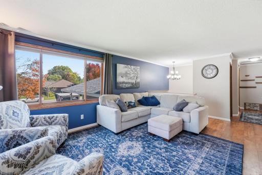 Comfortable and versatile, this space is ready to become the center of everyday living.