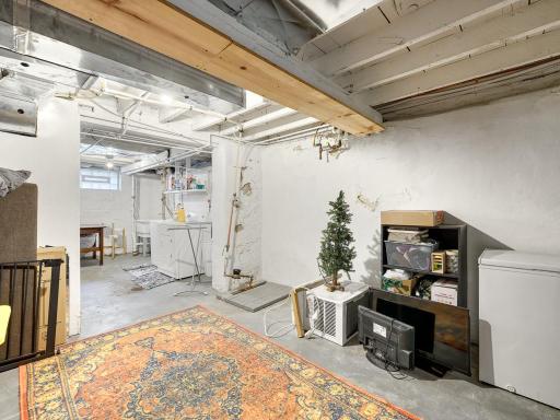 The lower level area, while not finished allows for excellent storage space. The washer and dryer are located in the basement.
