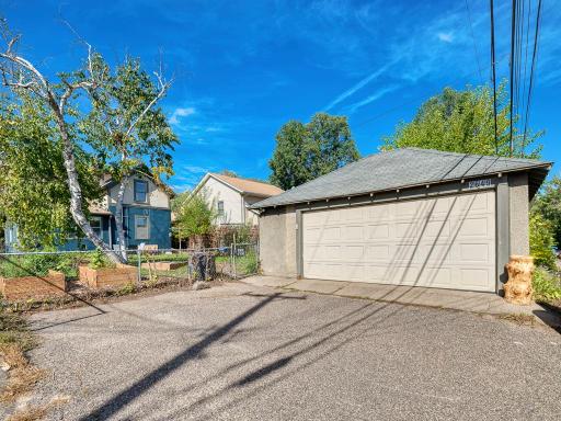 There is an oversized double garage with great space off the alley for parking in or outside the garage.
