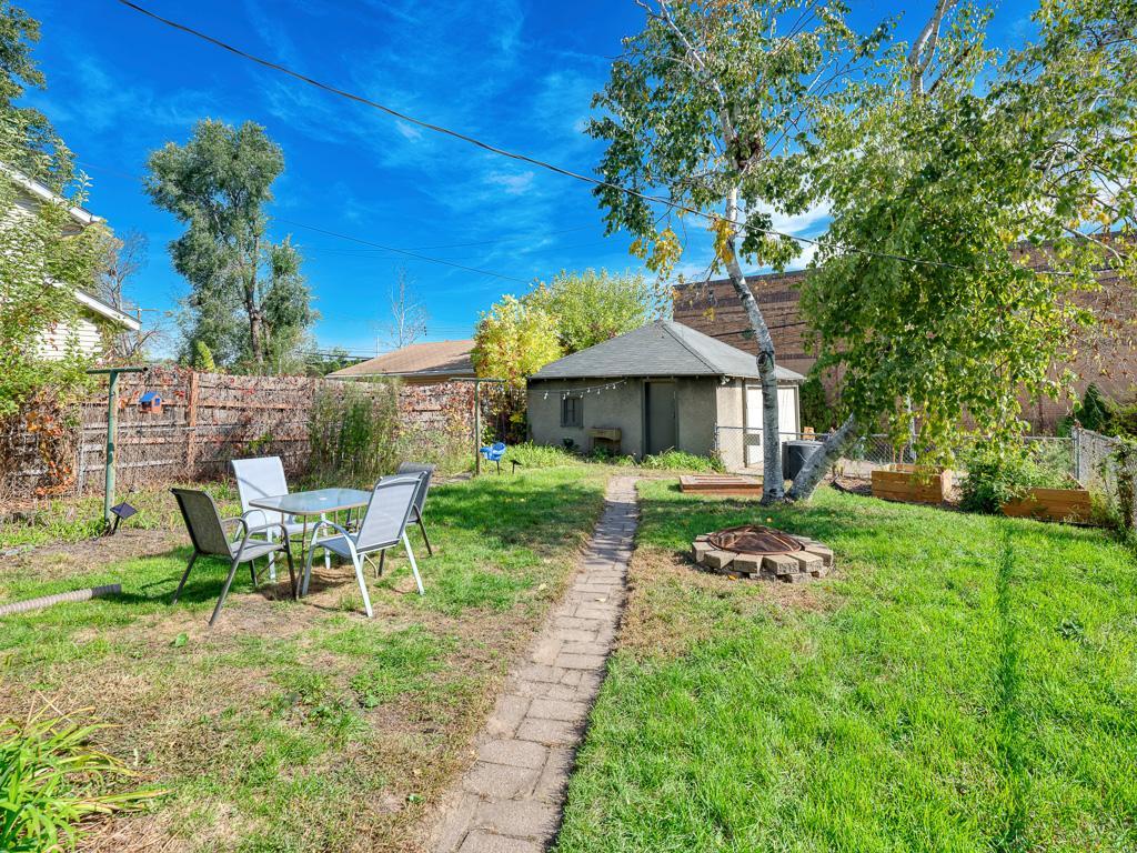The backyard space allows for a fire pit, garden and/or make it your own.