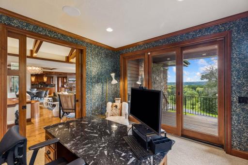 Step away to a private, designer-finished office, quiet yet close to the heart of the home