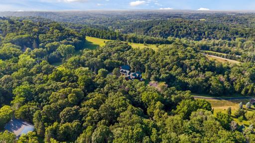 Aerial view of property with adjacent Belwin Conservancy land to the North.