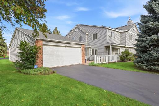 Beautiful curb appeal at your new home! Bonus end-unit with a front seating area. Driveways were just seal coated in September 2026.