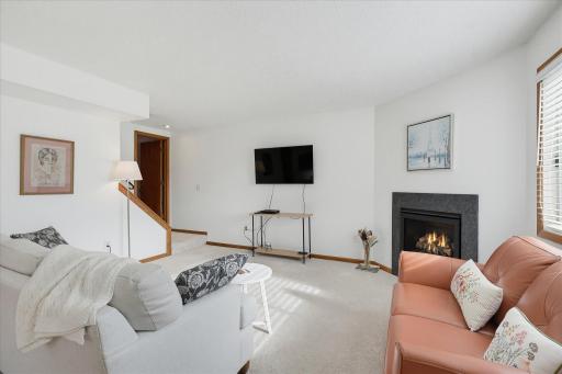 Living space that is very warm and inviting with a newer Hearth and Home fireplace.