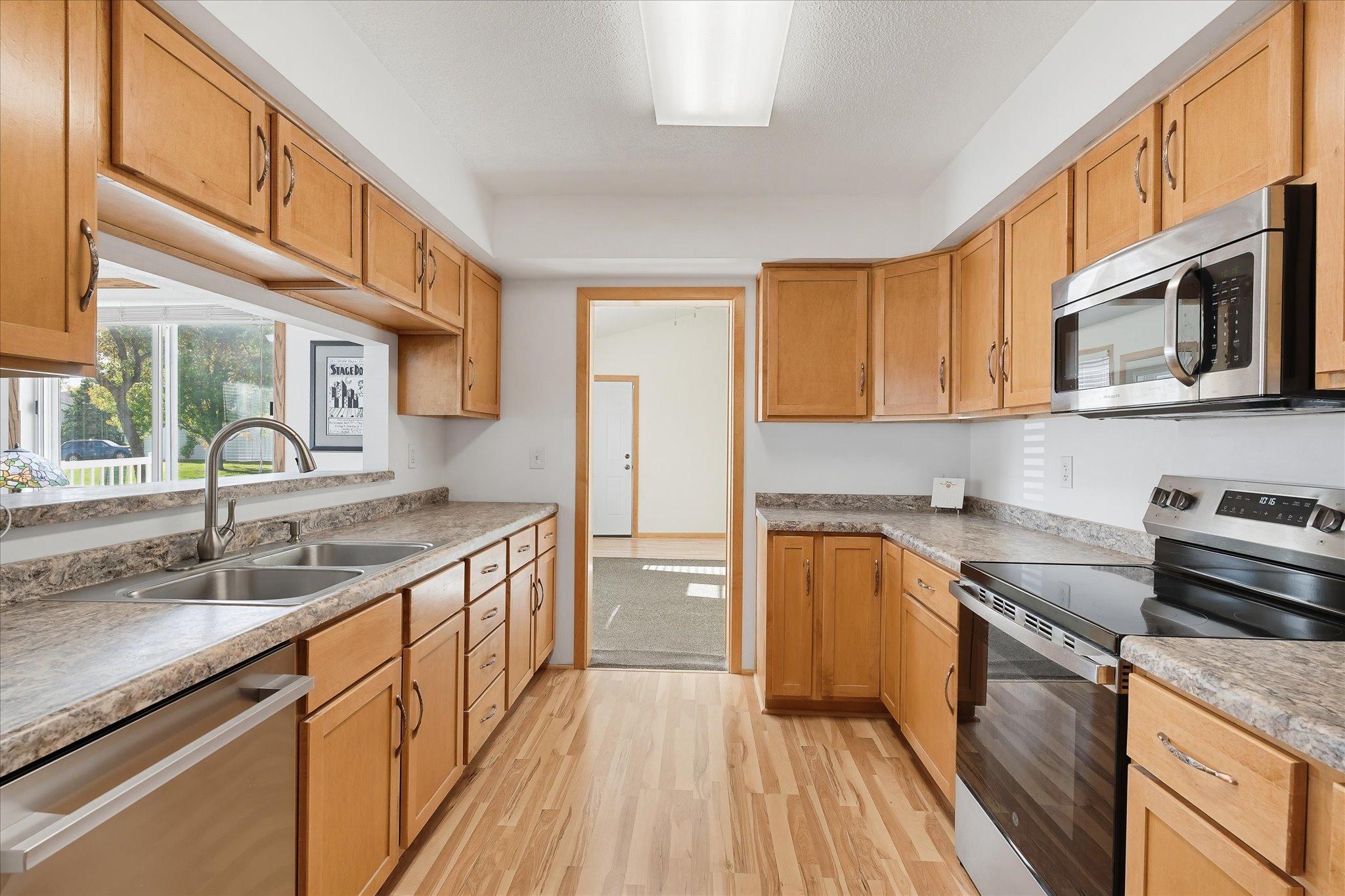 Great kitchen area that flows nicely on your main level. Newer stainless steel appliances. Newer range, dishwasher and refrigerator.