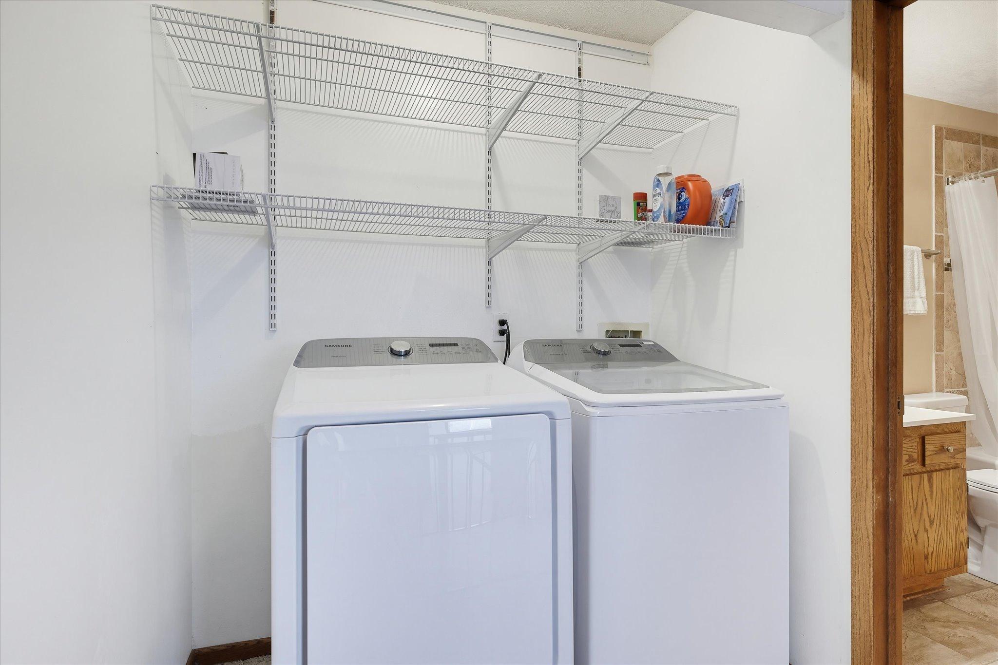 Washer and dryer are newer Samsungs! Great shelving space for organization.