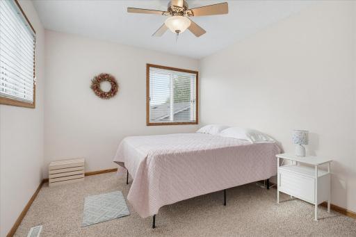 Bedroom #3 on the upper level that is filled with natural light.