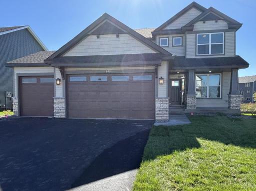 Welcome to 840 150th Ln NW! (Photo is of the actual home.)