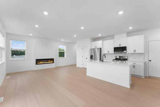 The kitchen overlooks shared rooms within the open layout, making it easy to prepare meals and snacks on the go