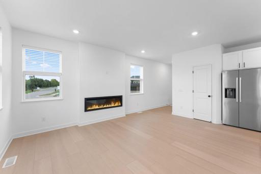 At select homesites is an optional fireplace to bring a warm glow to the space