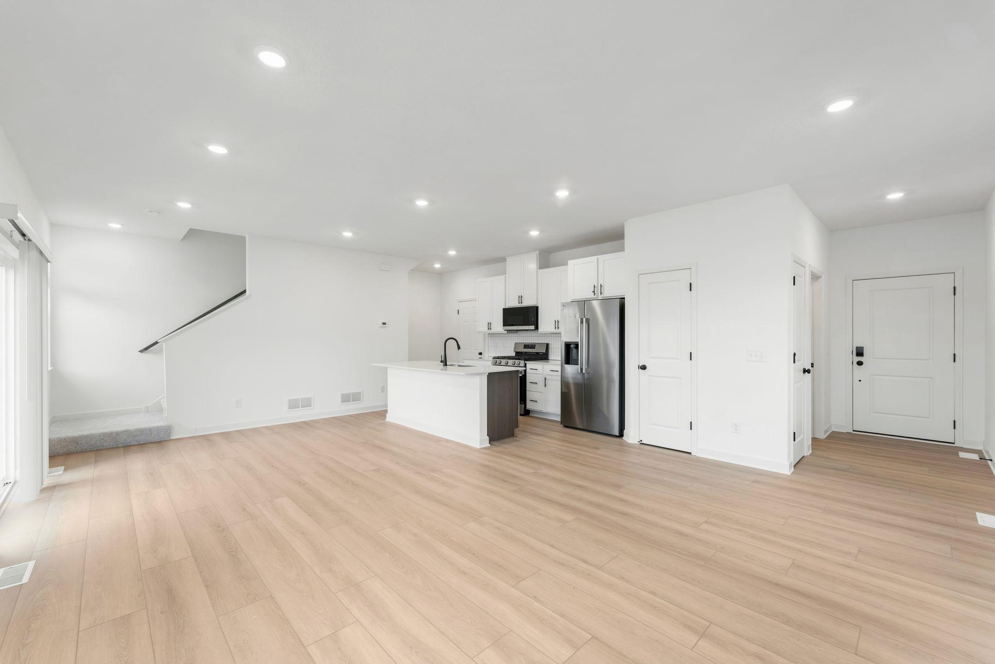 The kitchen overlooks shared rooms within the open layout, making it easy to prepare meals and snacks on the go