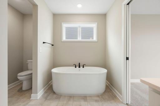 To add a touch of luxury, the freestanding tub offers rejuvenating spa-like experiences