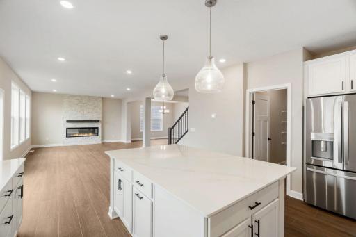 The kitchen overlooks the open layout for easy entertaining