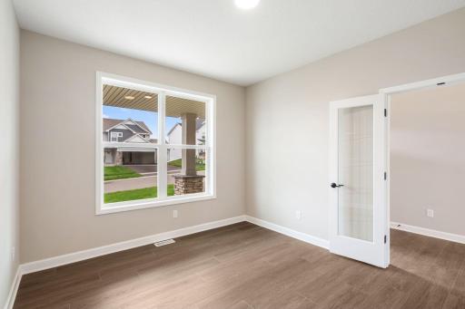 French doors seclude this study from the rest of the first floor, creating an environment ideal for work productivity.