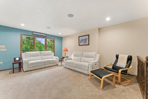 Spacious living room with a large south-facing window that brings in lots of natural light.