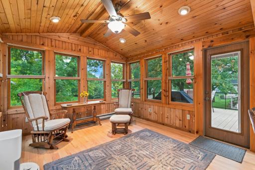A wonderful room to enjoy year-round, with a beautiful deck right off the porch.
