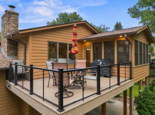 Enjoy outdoor cooking and entertaining on the Timbertech maintence free deck.