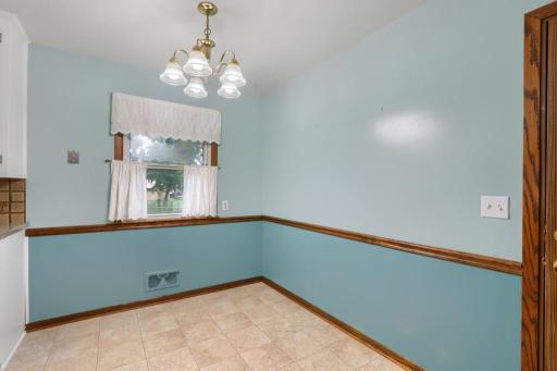 Eat in Kitchen - room for a table and chairs. Access to the side patio and basement from this room.