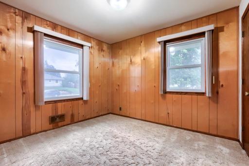 Bedroom #2 - Main Floor - Hardwood floors under the carpet.