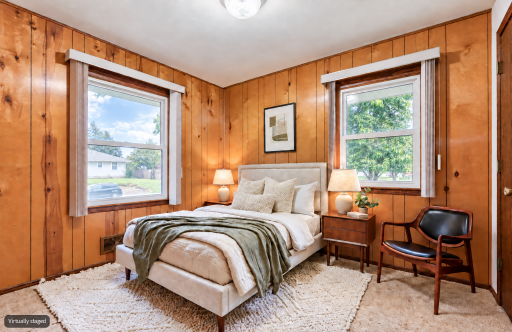 Bedroom with wood paneling - virtually staged.