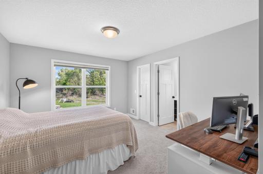 Bedroom #2 with walk in closet and private bathroom ensuite