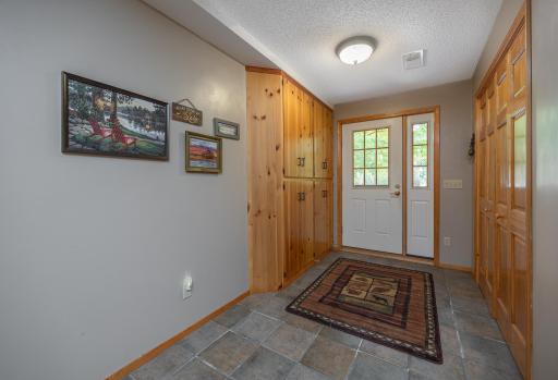 Spacious lower level entryway with storage